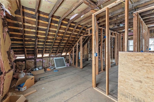 miscellaneous room featuring vaulted ceiling