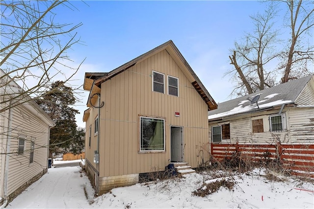 exterior space with entry steps and fence