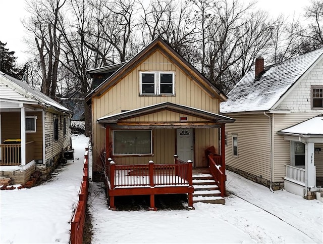 view of front of property with board and batten siding and covered porch