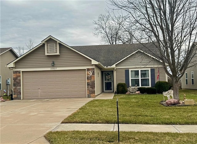 ranch-style house with a garage and a front lawn