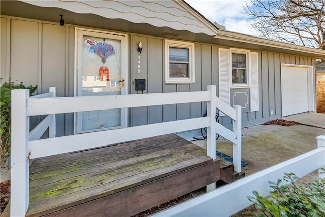 property entrance with a garage