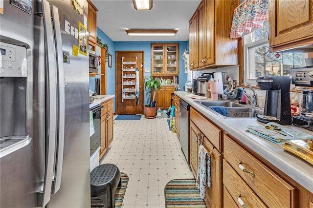 kitchen featuring appliances with stainless steel finishes and sink