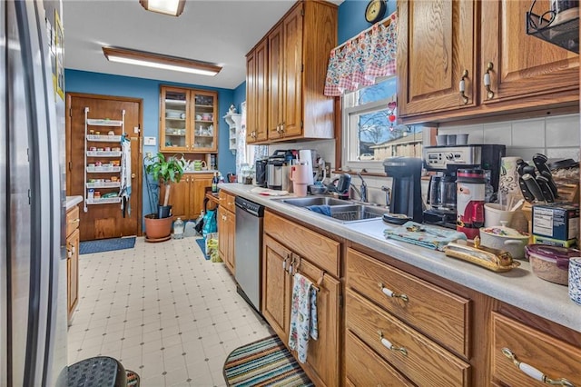 kitchen featuring appliances with stainless steel finishes and sink