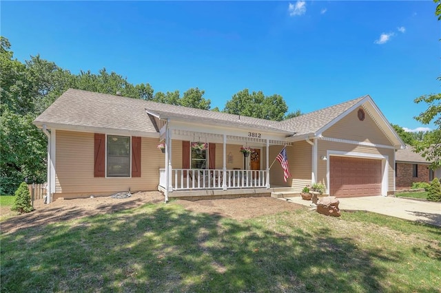 3812 SW Windemere Dr, Lees Summit, MO 64082 - ranch-style house featuring a porch, an attached garage, a front lawn, and driveway