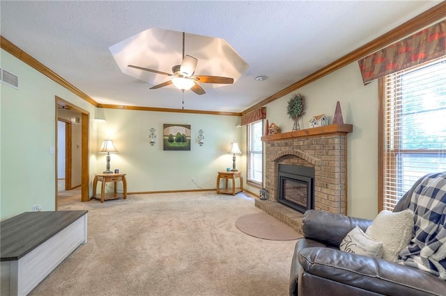 3812 SW Windemere Dr, Lees Summit, MO 64082 - carpeted living room featuring crown molding, a fireplace, and ceiling fan