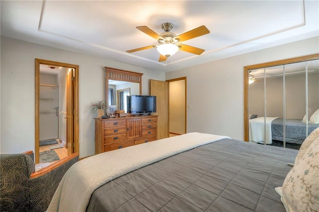 3812 SW Windemere Dr, Lees Summit, MO 64082 - bedroom with a closet, a ceiling fan, and connected bathroom