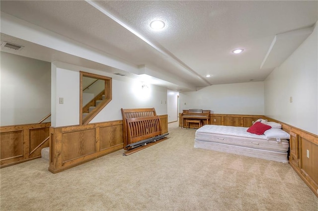 3812 SW Windemere Dr, Lees Summit, MO 64082 - carpeted bedroom featuring wainscoting, recessed lighting, and a textured ceiling