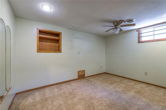 3812 SW Windemere Dr, Lees Summit, MO 64082 - carpeted spare room with a textured ceiling and a ceiling fan
