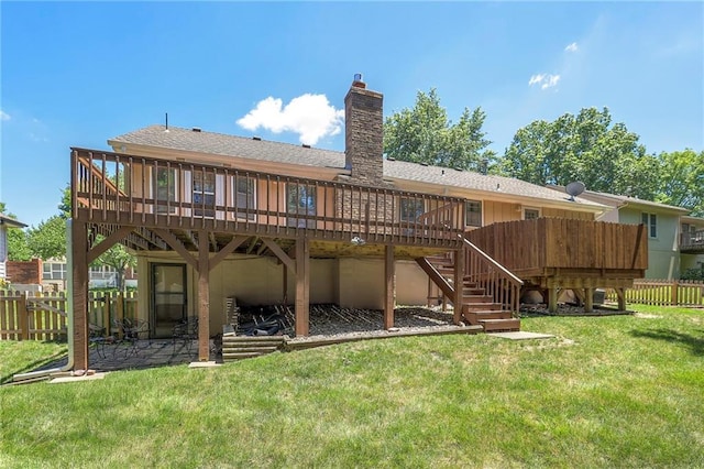 3812 SW Windemere Dr, Lees Summit, MO 64082 - rear view of house featuring a deck, stairway, a chimney, a shingled roof, and a patio area