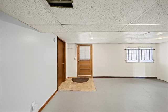 basement with a drop ceiling