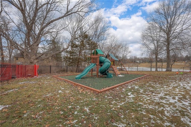 community playground featuring fence and a yard