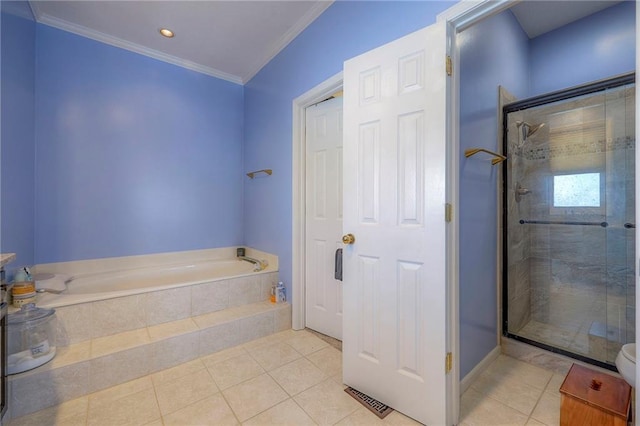 full bathroom featuring tile patterned flooring, crown molding, a shower stall, and a bath