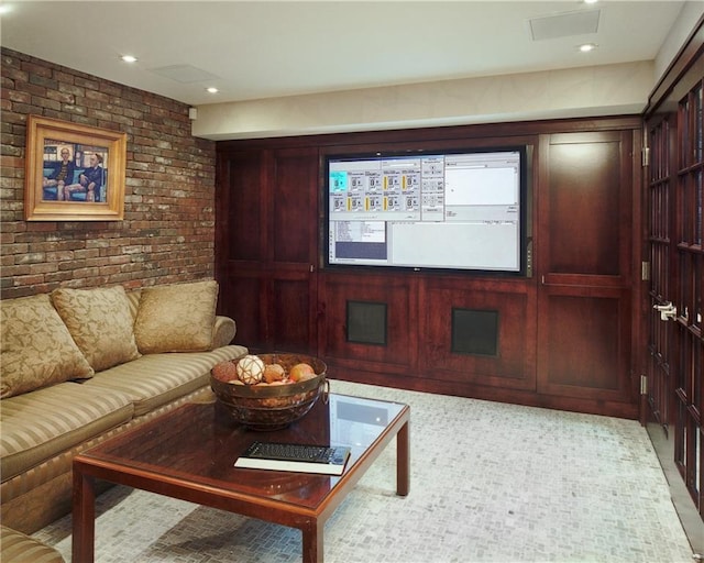 cinema room with brick wall