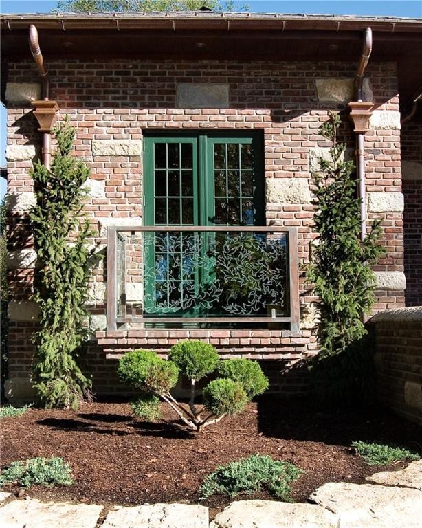 view of property exterior with french doors