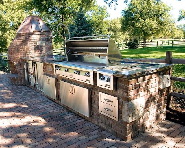 view of patio / terrace with exterior kitchen