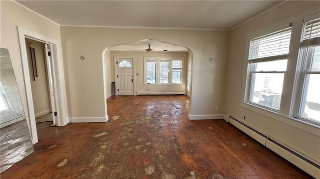 foyer entrance featuring arched walkways, crown molding, a baseboard radiator, baseboards, and baseboard heating