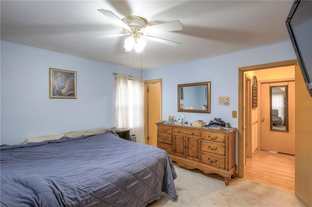 10111 E 86th Ter, Raytown, MO 64138 - carpeted bedroom featuring ceiling fan