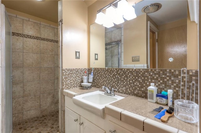 10111 E 86th Ter, Raytown, MO 64138 - bathroom featuring vanity and decorative backsplash