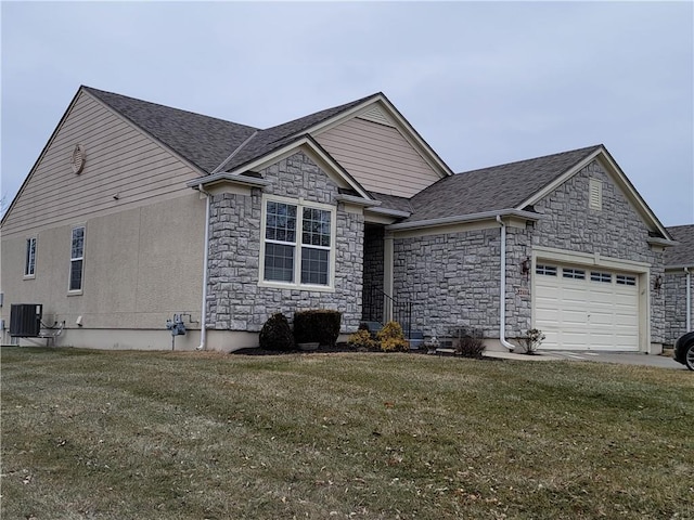 view of front facade featuring central AC unit, a garage, and a front lawn