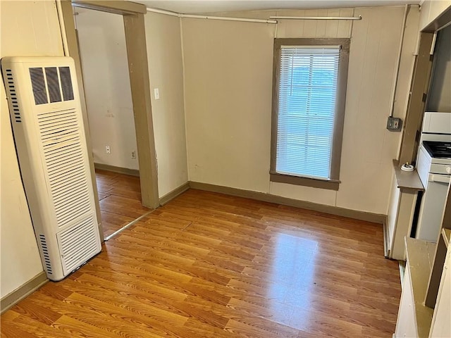 unfurnished room featuring light hardwood / wood-style floors