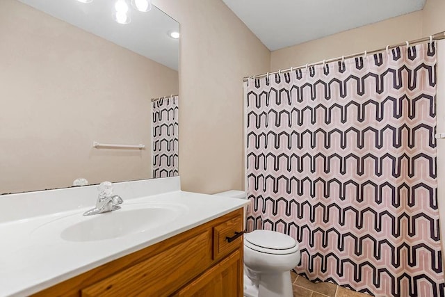 full bathroom with tile patterned flooring, toilet, vanity, and a shower with curtain