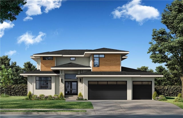 view of front facade featuring a garage and a front lawn