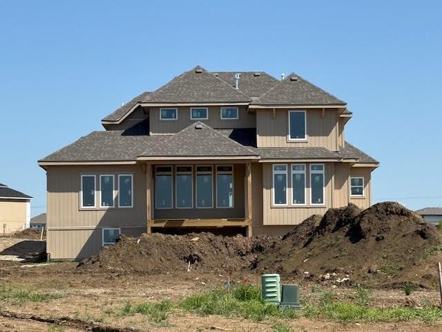 12505 W 184th St, Overland Park, KS 66013 - back of property with roof with shingles