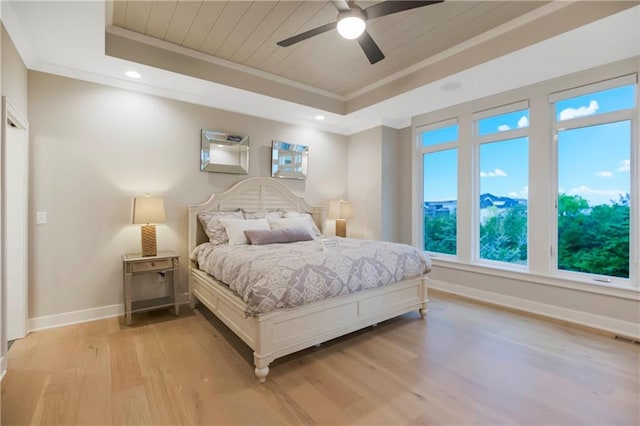 12505 W 184th St, Overland Park, KS 66013 - bedroom with a raised ceiling, light wood-style floors, baseboards, crown molding, and wood ceiling