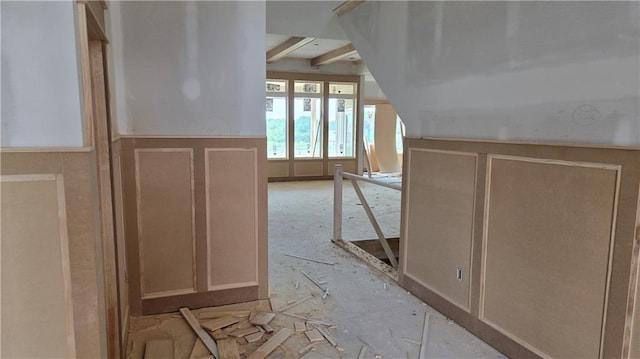 12505 W 184th St, Overland Park, KS 66013 - hall featuring beam ceiling and a decorative wall