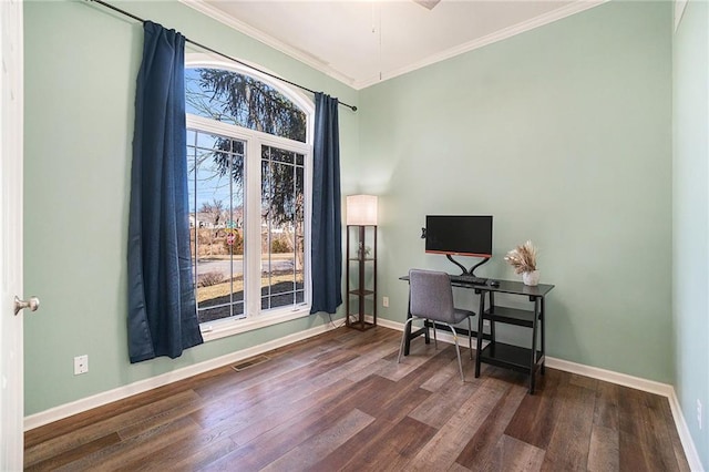 office space featuring visible vents, baseboards, dark wood-style flooring, and crown molding