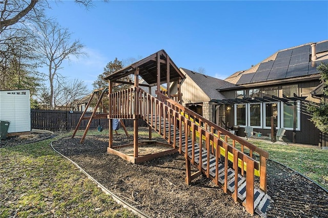 view of play area with fence