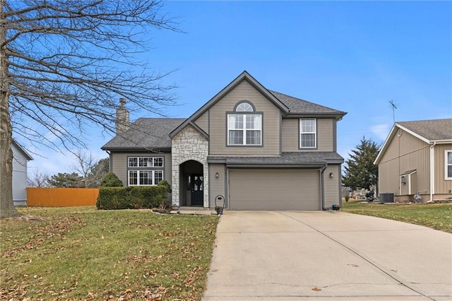 view of front facade with a garage, central AC unit, and a front lawn