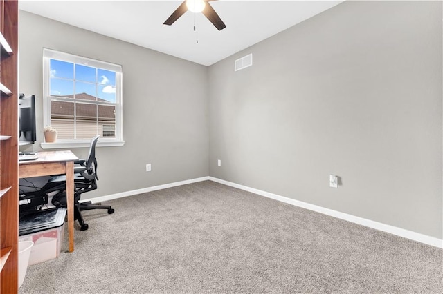 office area featuring ceiling fan, carpet, visible vents, and baseboards