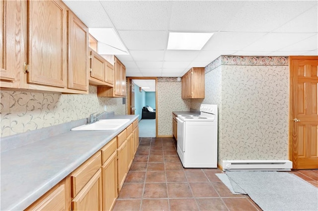 kitchen featuring a sink, wallpapered walls, baseboard heating, and white electric range