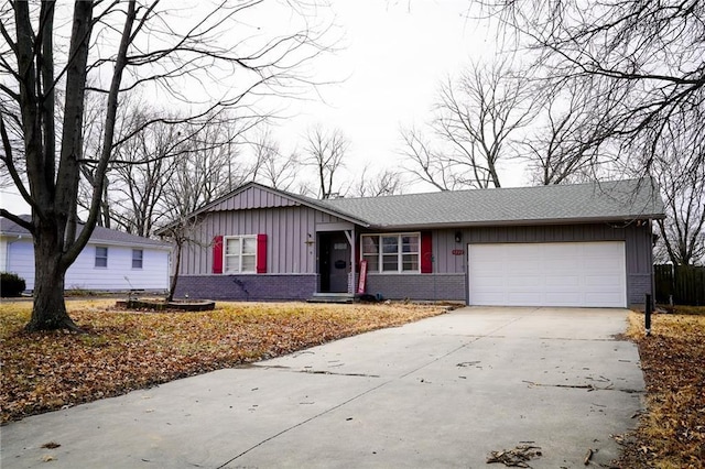 single story home featuring a garage