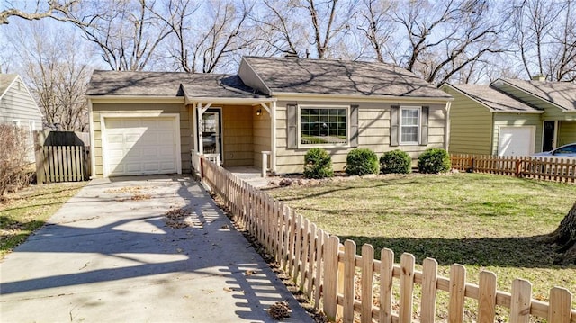 single story home featuring a garage, concrete driveway, a front yard, and fence