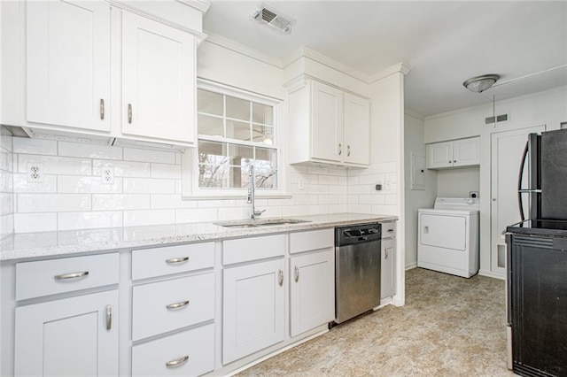 kitchen with visible vents, dishwasher, washer / clothes dryer, fridge, and a sink