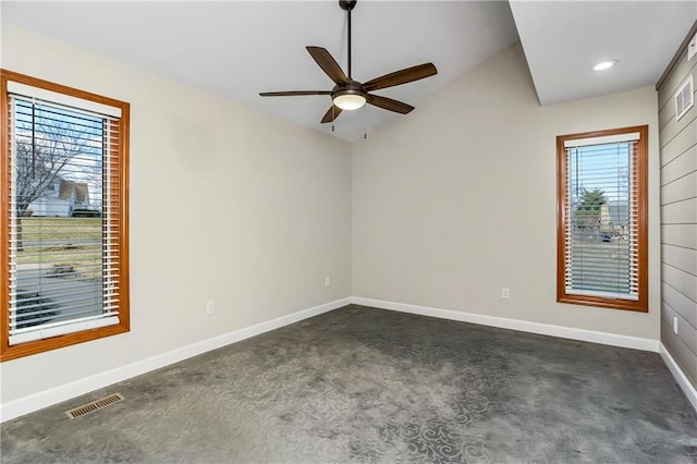 empty room with recessed lighting, visible vents, ceiling fan, and baseboards