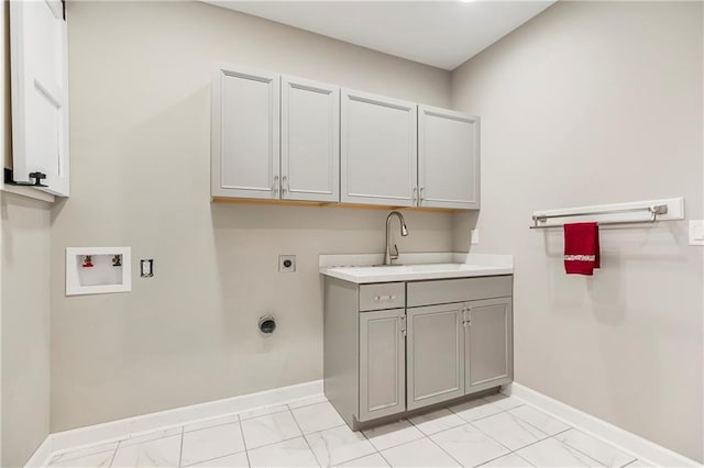 clothes washing area featuring hookup for a washing machine, baseboards, cabinet space, electric dryer hookup, and marble finish floor