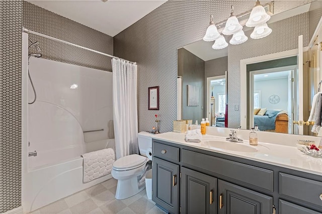 ensuite bathroom featuring wallpapered walls, toilet, shower / tub combo with curtain, vanity, and ensuite bath