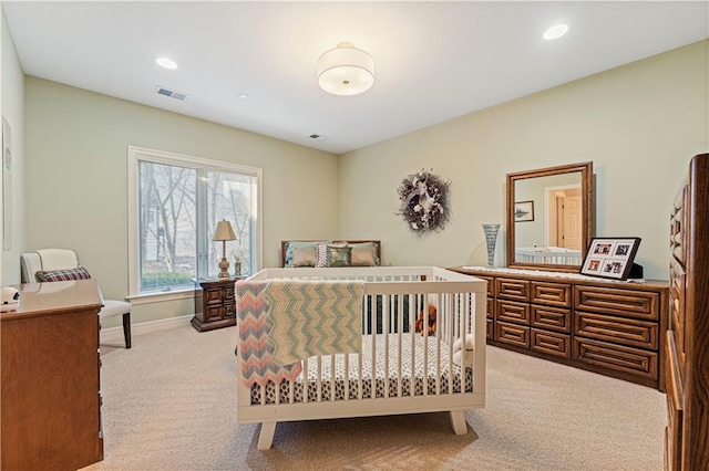 carpeted bedroom with visible vents, recessed lighting, and baseboards