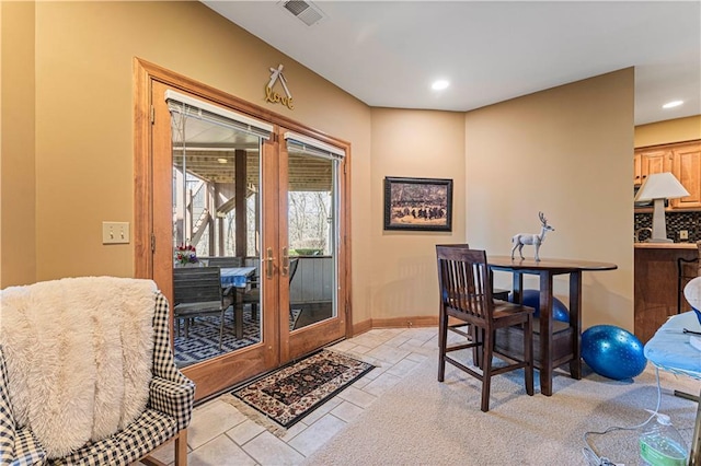 dining room with visible vents, recessed lighting, french doors, and baseboards