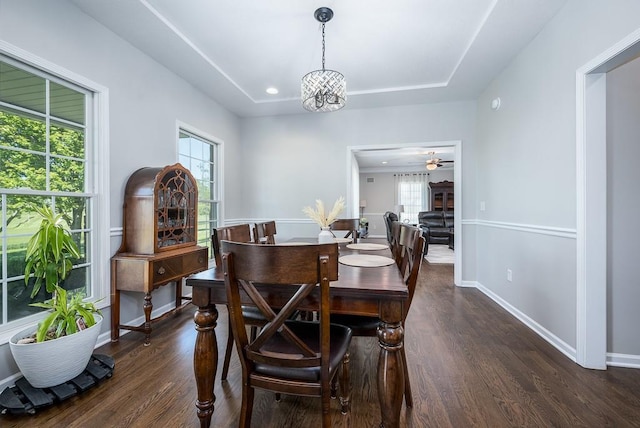 22330 Mclouth Rd, Mclouth, KS 66054 - dining space with a tray ceiling, dark wood finished floors, recessed lighting, a ceiling fan, and baseboards