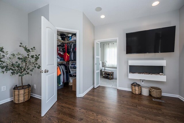 22330 Mclouth Rd, Mclouth, KS 66054 - interior space with baseboards, wood finished floors, and recessed lighting