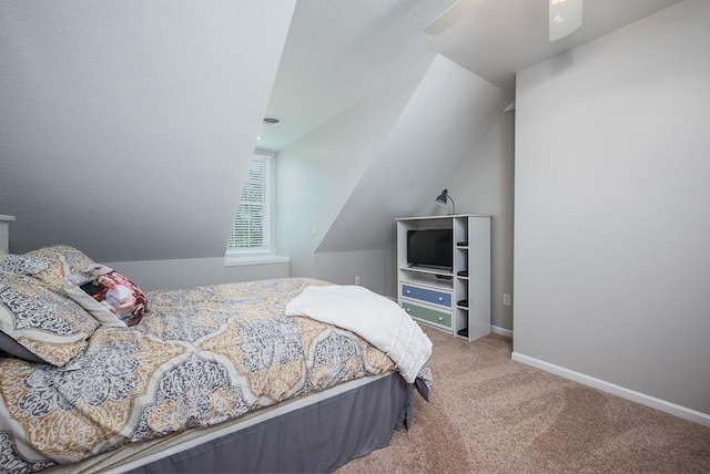 22330 Mclouth Rd, Mclouth, KS 66054 - bedroom with a ceiling fan, light carpet, vaulted ceiling, and baseboards