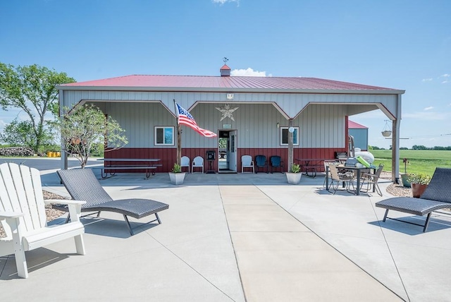 22330 Mclouth Rd, Mclouth, KS 66054 - rear view of house with a patio area