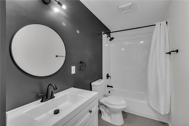 full bathroom with vanity, shower / tub combo, tile patterned floors, and toilet