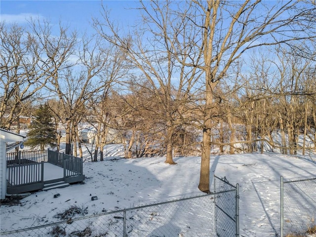 view of yard layered in snow