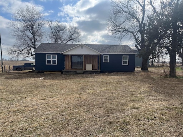 ranch-style house with a front yard