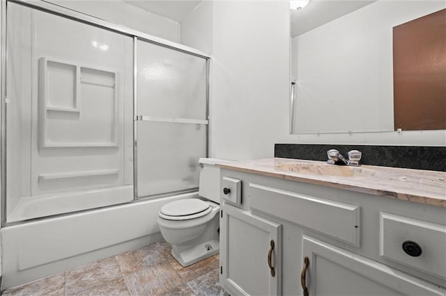 full bath with enclosed tub / shower combo, toilet, and vanity